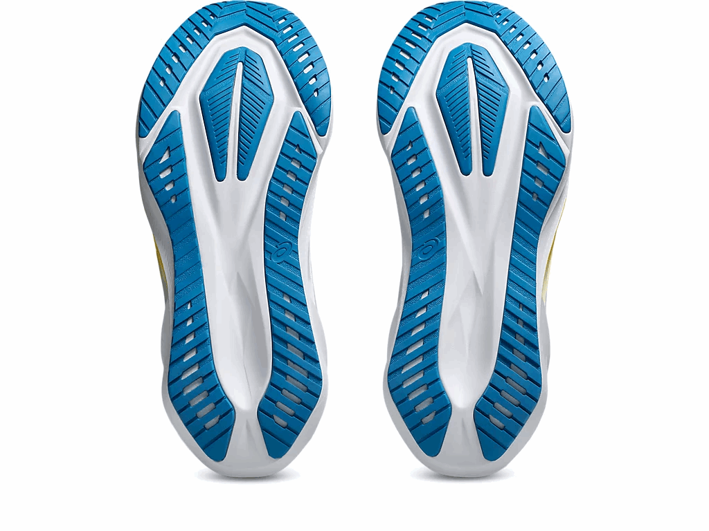 Gray-white men's ASICS Novablast 5 running shoe outsole with blue traction pods and deep vertical tread.