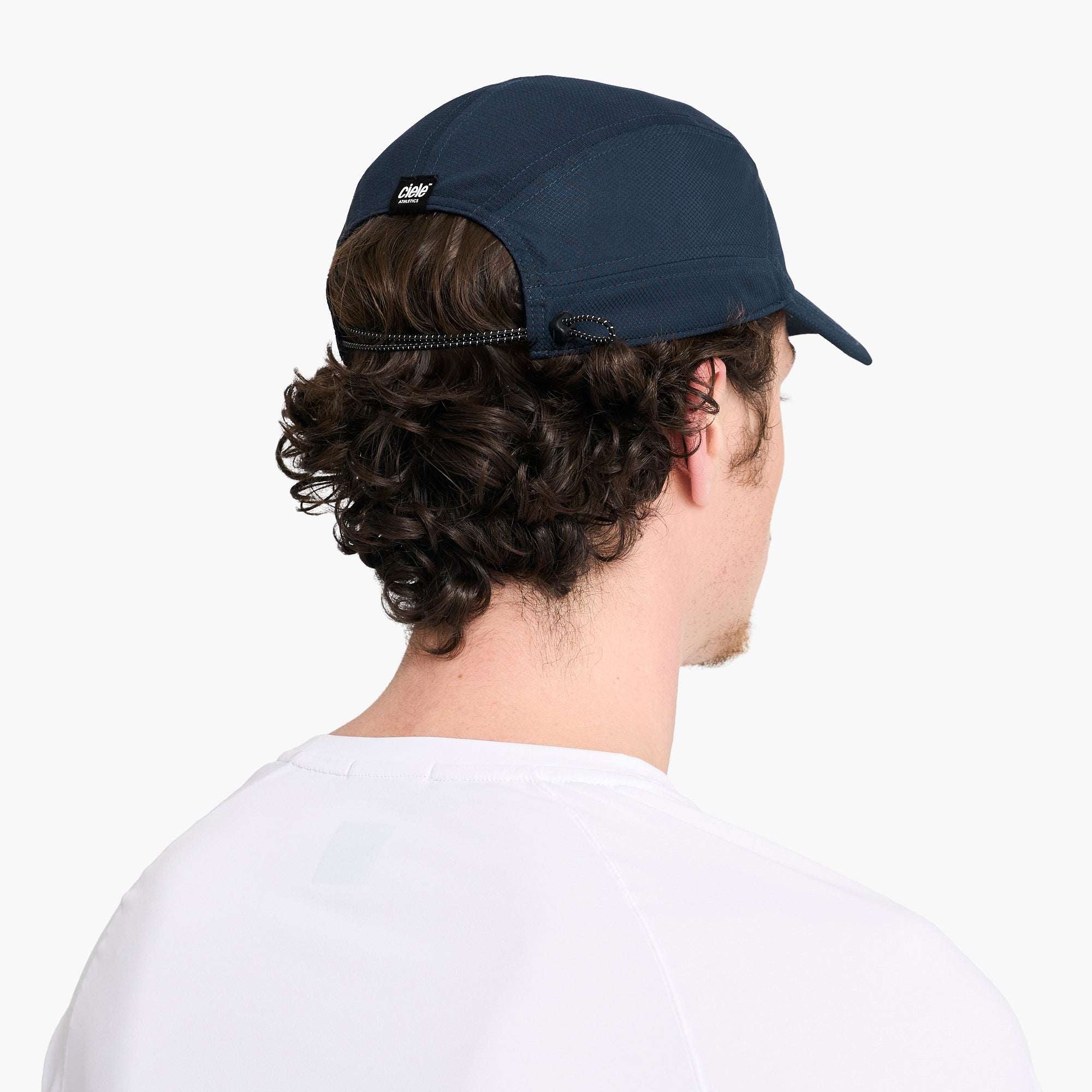 Ciele Dark navy running cap viewed from back, adjustable strap visible