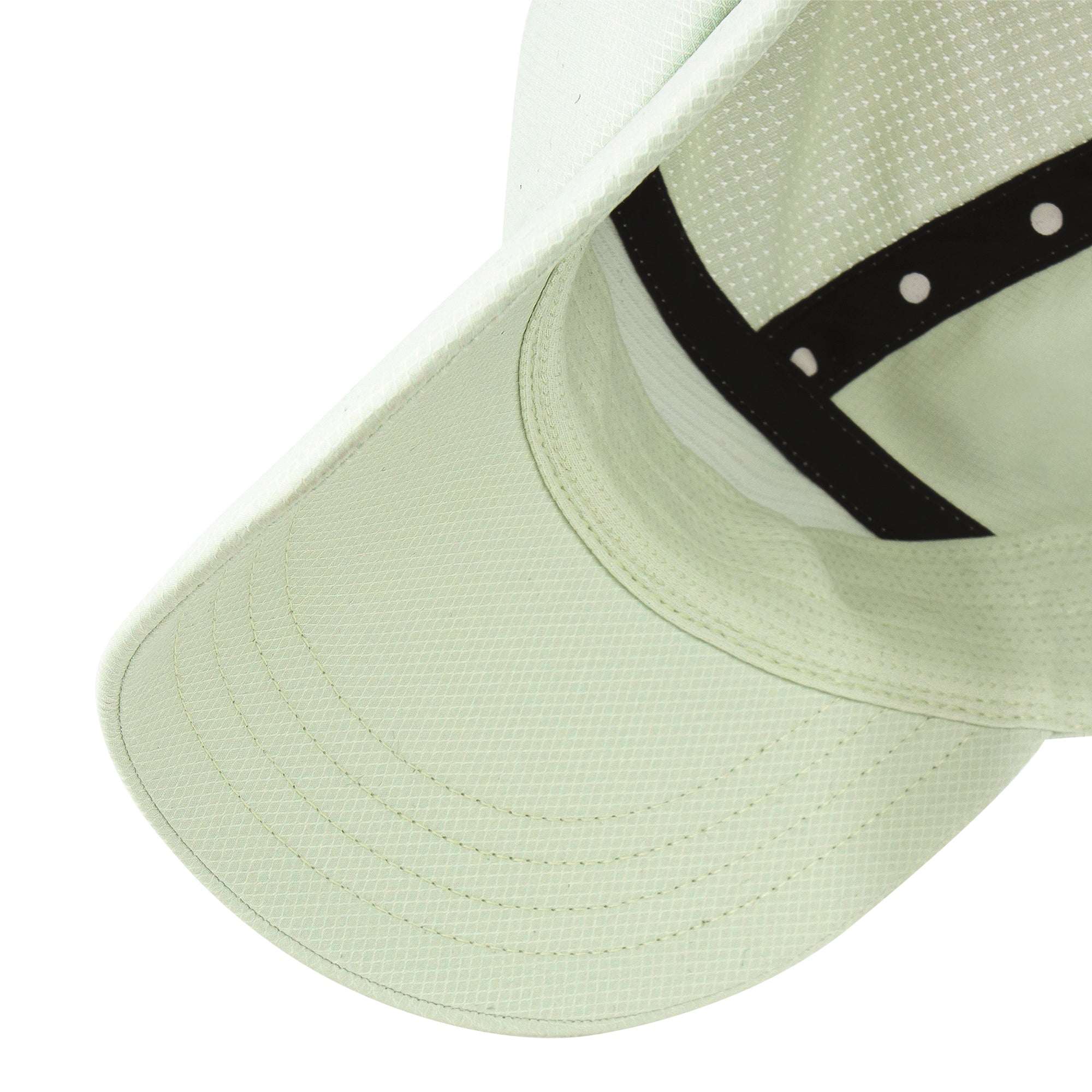 Light moss Ciele cap close-up of textured panels and curved brim