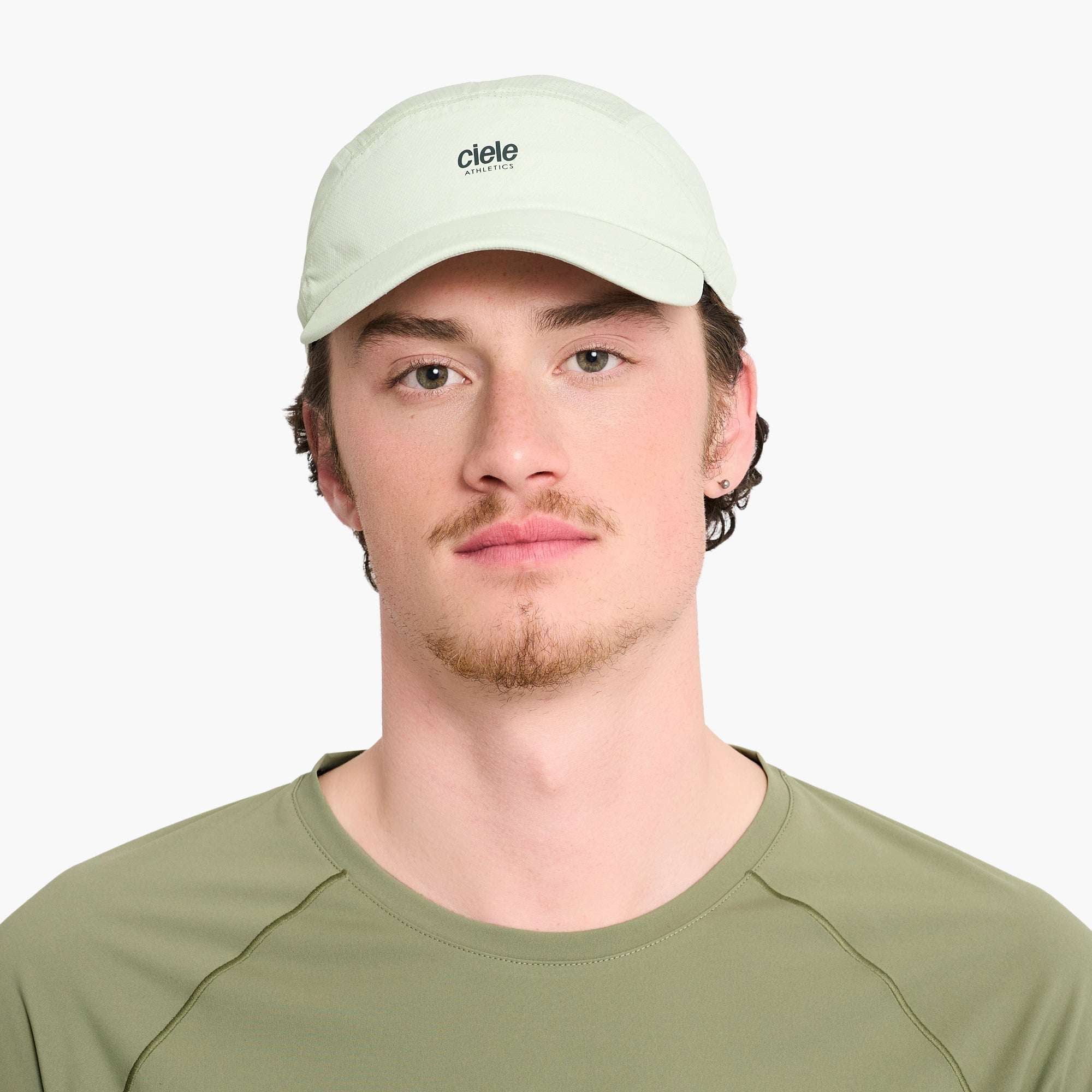 Light moss Ciele FSTCap Classic cap on model, front logo visible