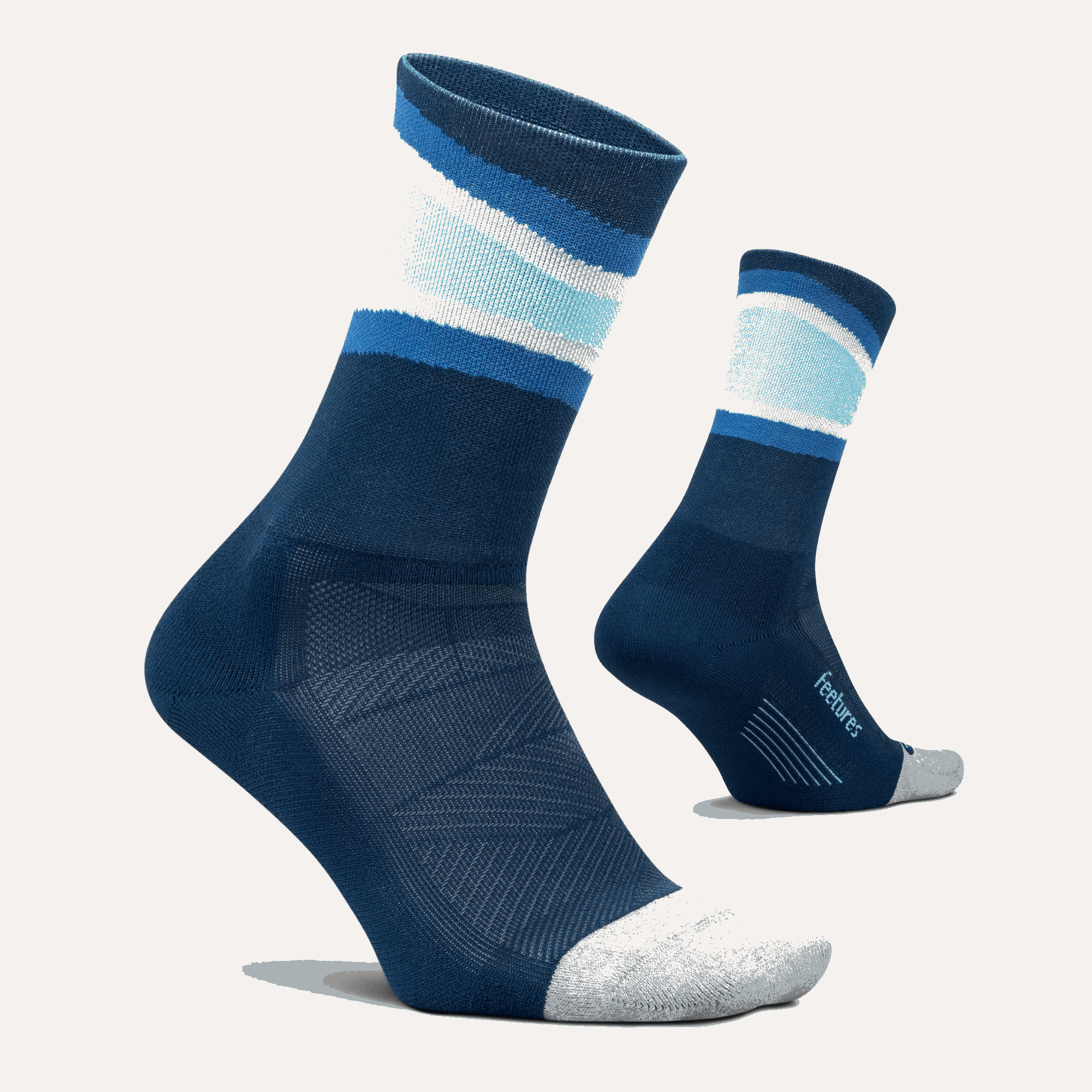Feetures Pair of mini crew socks with navy base and light blue horizontal stripes