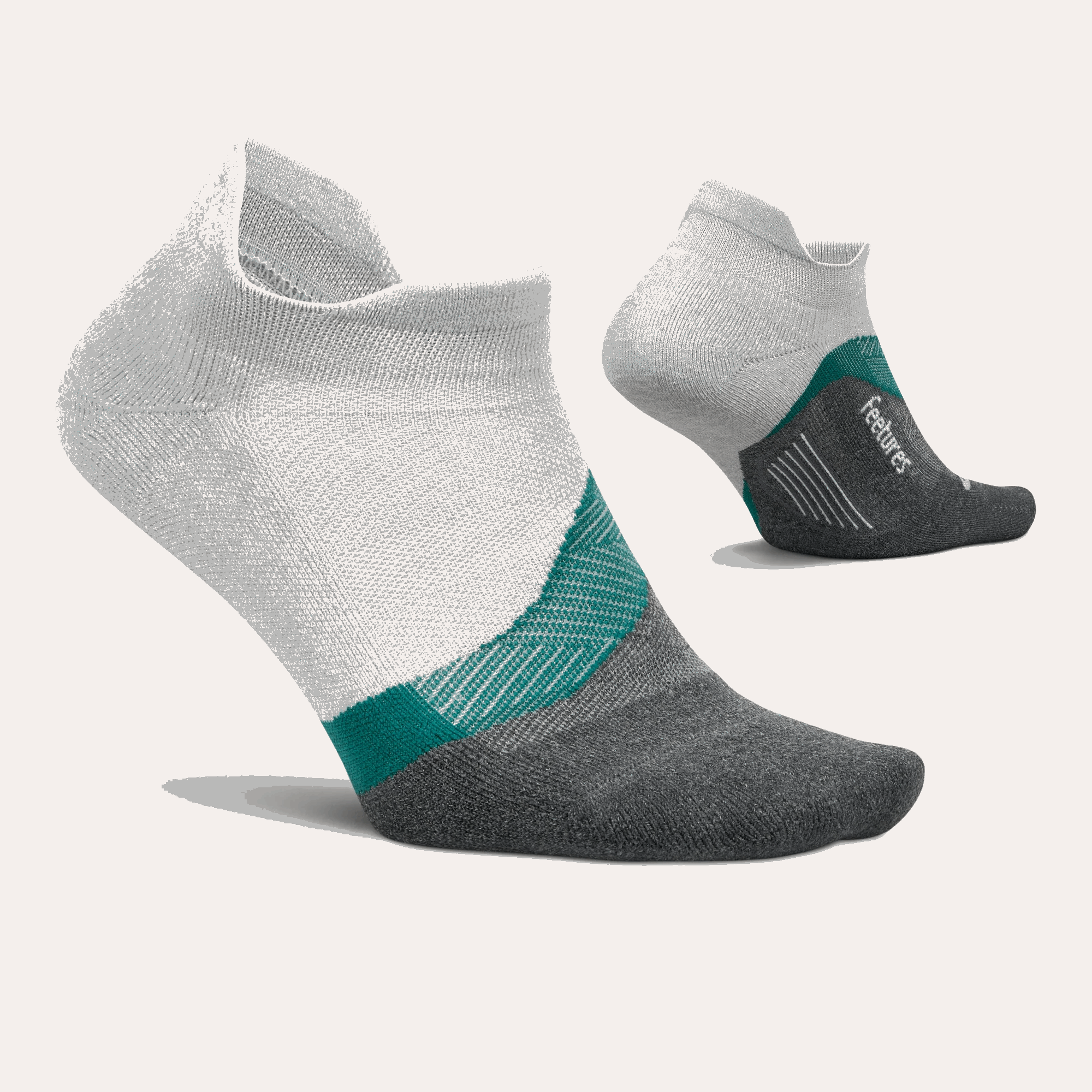 Pair of Feetures no-show tab socks, gray knit with teal and dark gray heel panel