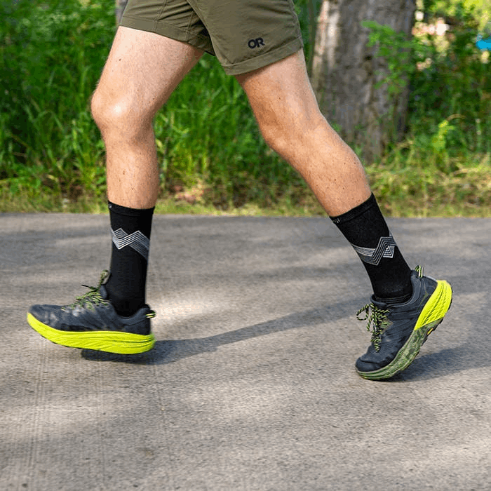 Black crew Injinji running socks with gray chevron at ankle and five-toe tips