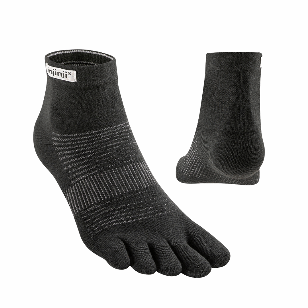 Pair of Injinji mini-crew Injinji running socks in black, five-toe split design