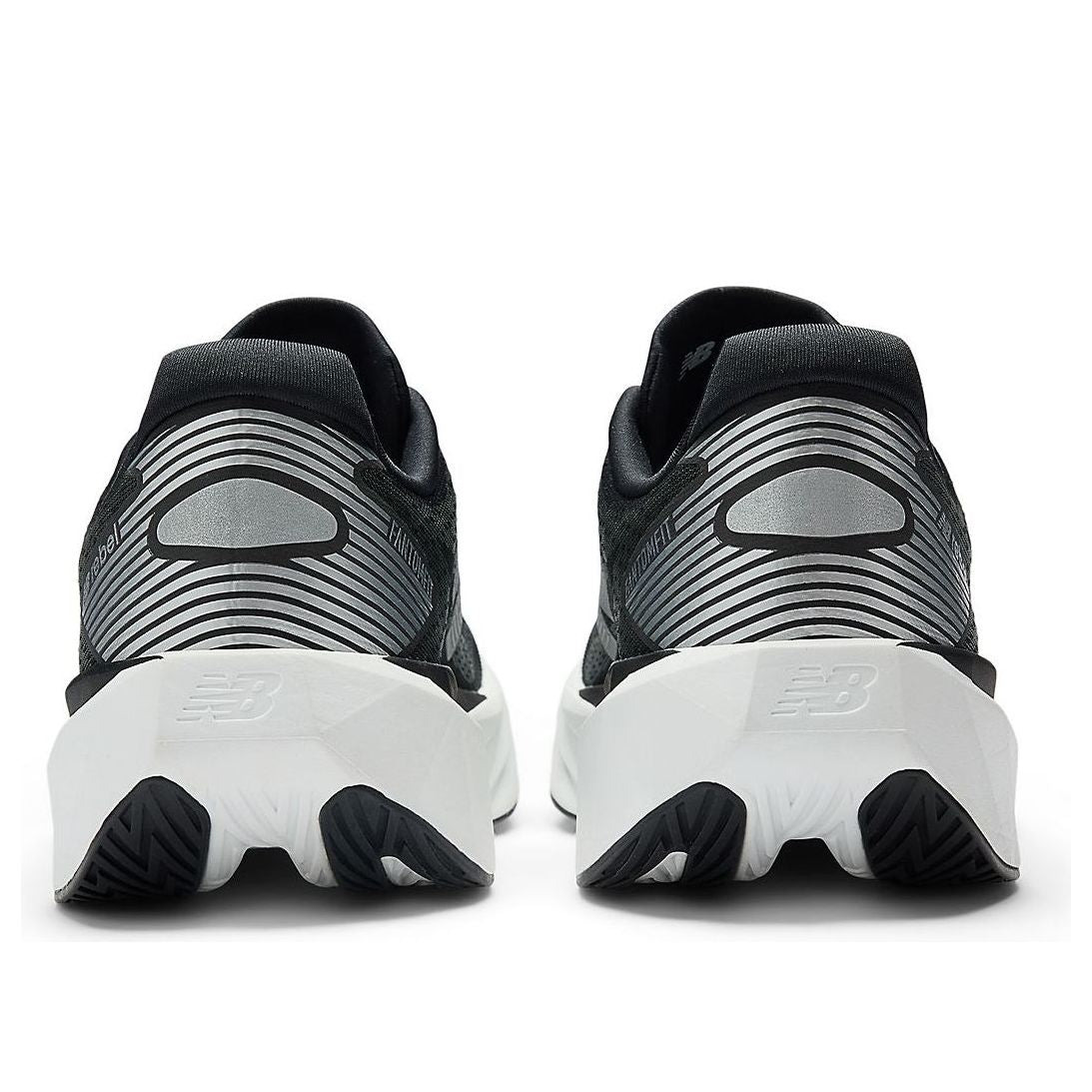 New Balance Men Rebel v5 Wide - Black / Silver Metallic