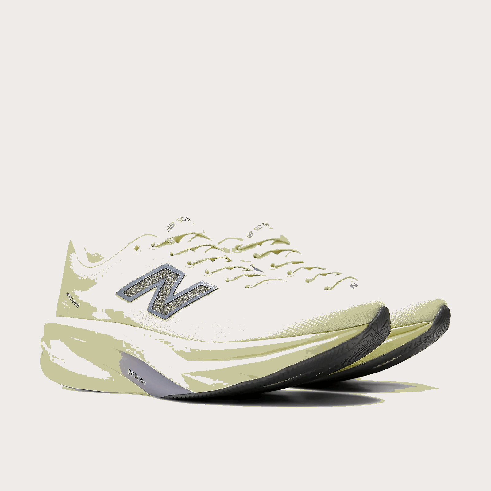 Women’s New Balance SuperComp Rebel running shoe, pistachio butter upper with side N logo and lace-up